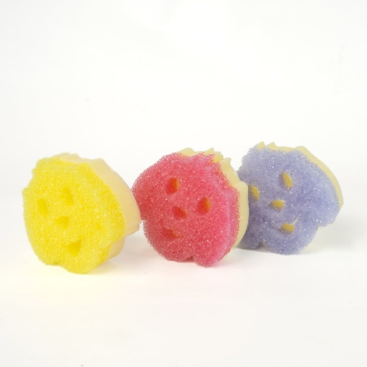 Dog shaped sponges out of packaging front view